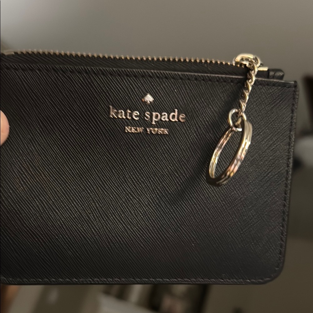 Kate Spade Black Leather Wristlet in Excellent Condition 5” x 4” no flaws
